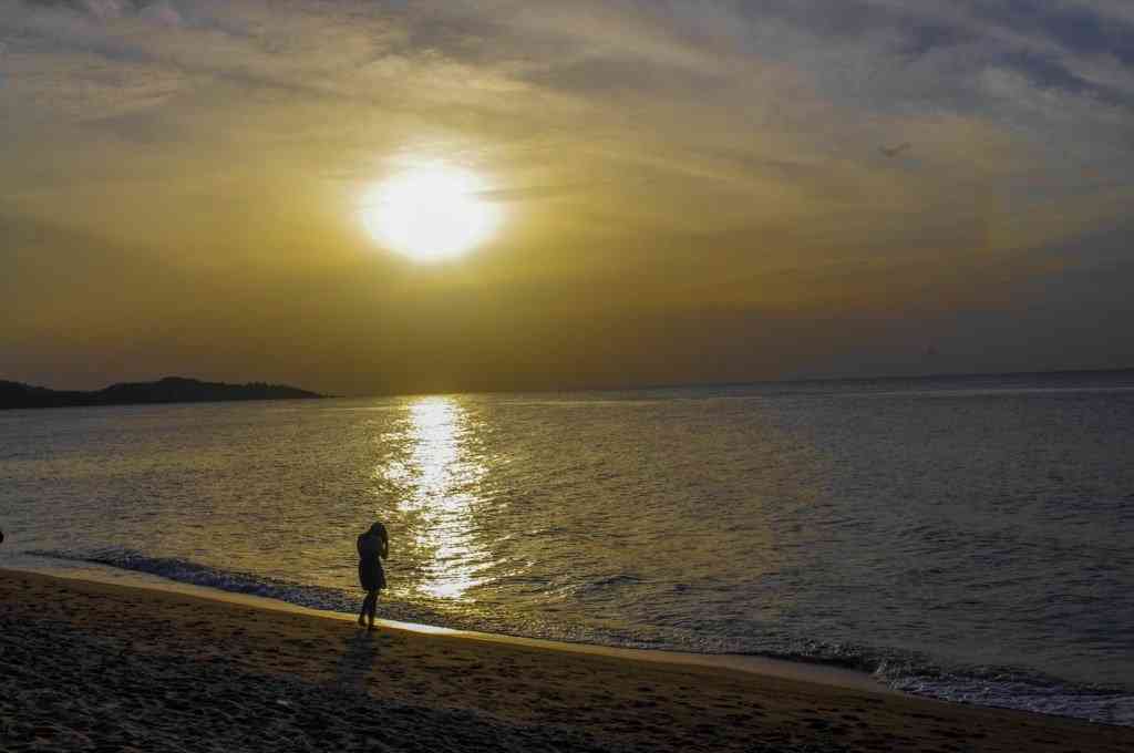 Shadow of woman during sunset in Koh Samui Thailand_