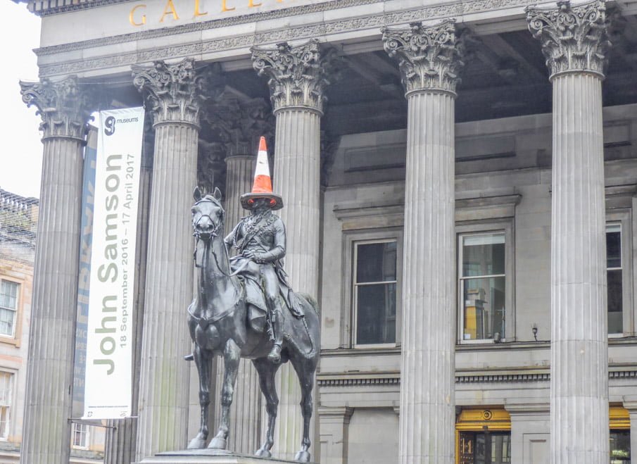 Statue of Wellington on horse with cone on head in Glasgow