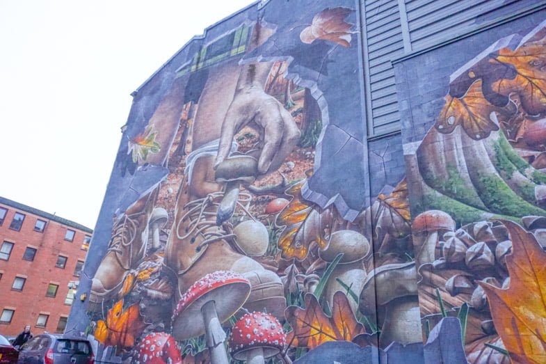 Street art mural with nature on end of building in Glasgow