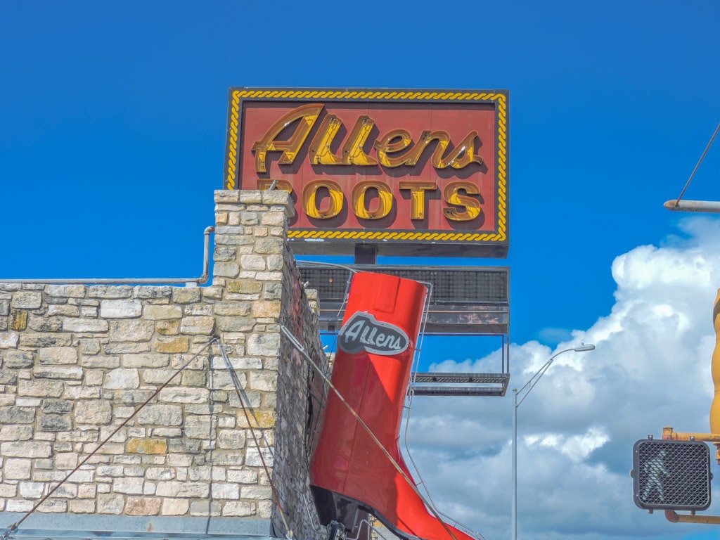 Allens Boots red sign with blue skies South Congress Austin