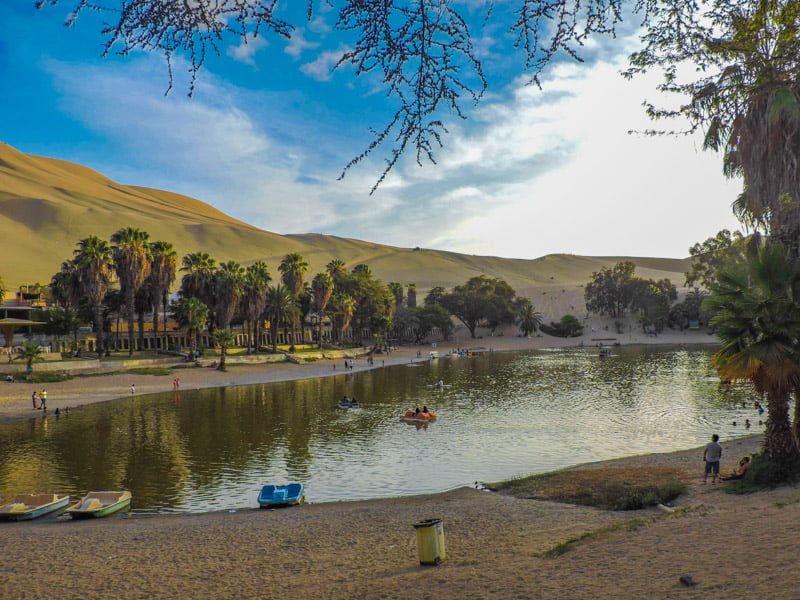 Huacachina lagoon with sand dunes in Peru