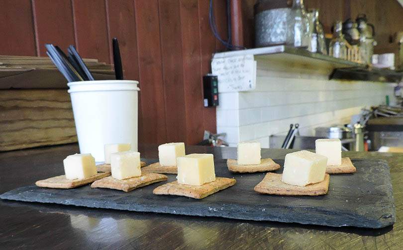 Beechers Homemade Cheese on a board at Pike Place Market Seattle