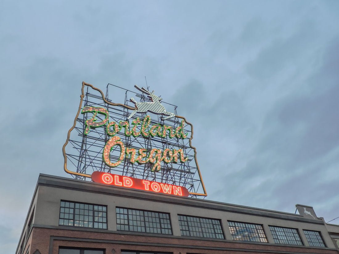 Portland Sign lit up at dusk
