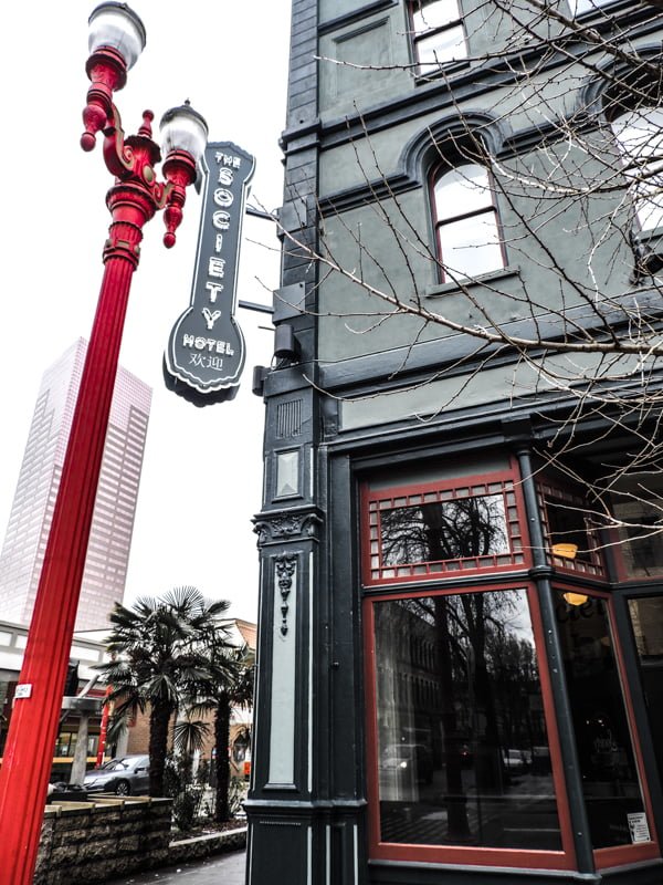 Exterior of The Society Hotel Portland with red lamp