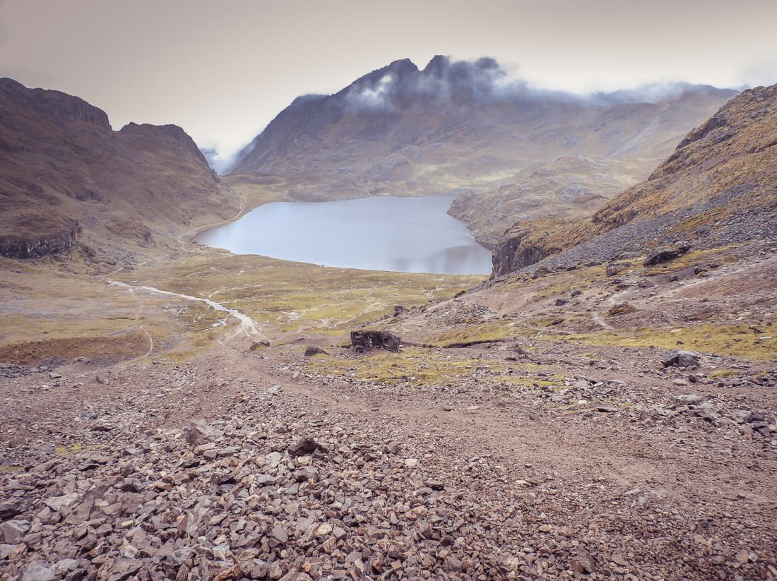 Stone crater with water on Lares Trail in Peru