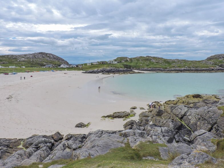 Achmelvich Beach white sand and turquoise waters on the North Coast 500 Scotland Highlands