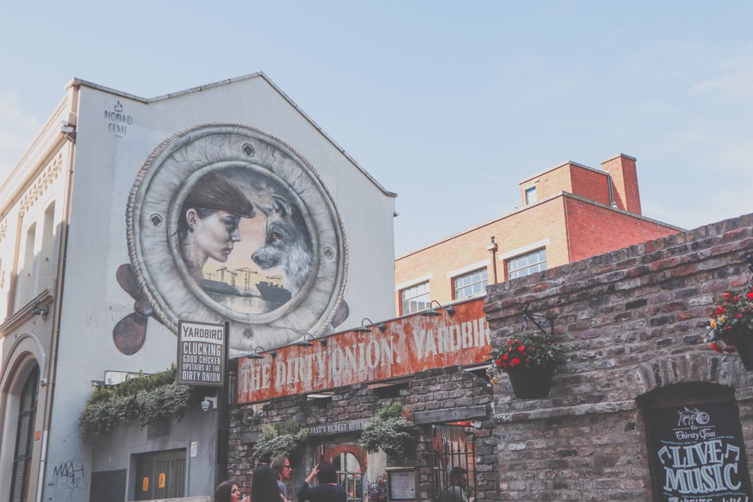 The Dirty Onion mural of woman and wolf in Belfast