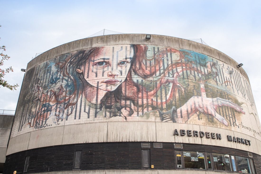 Aberdeen Nuart haunting girl mural looks down on city