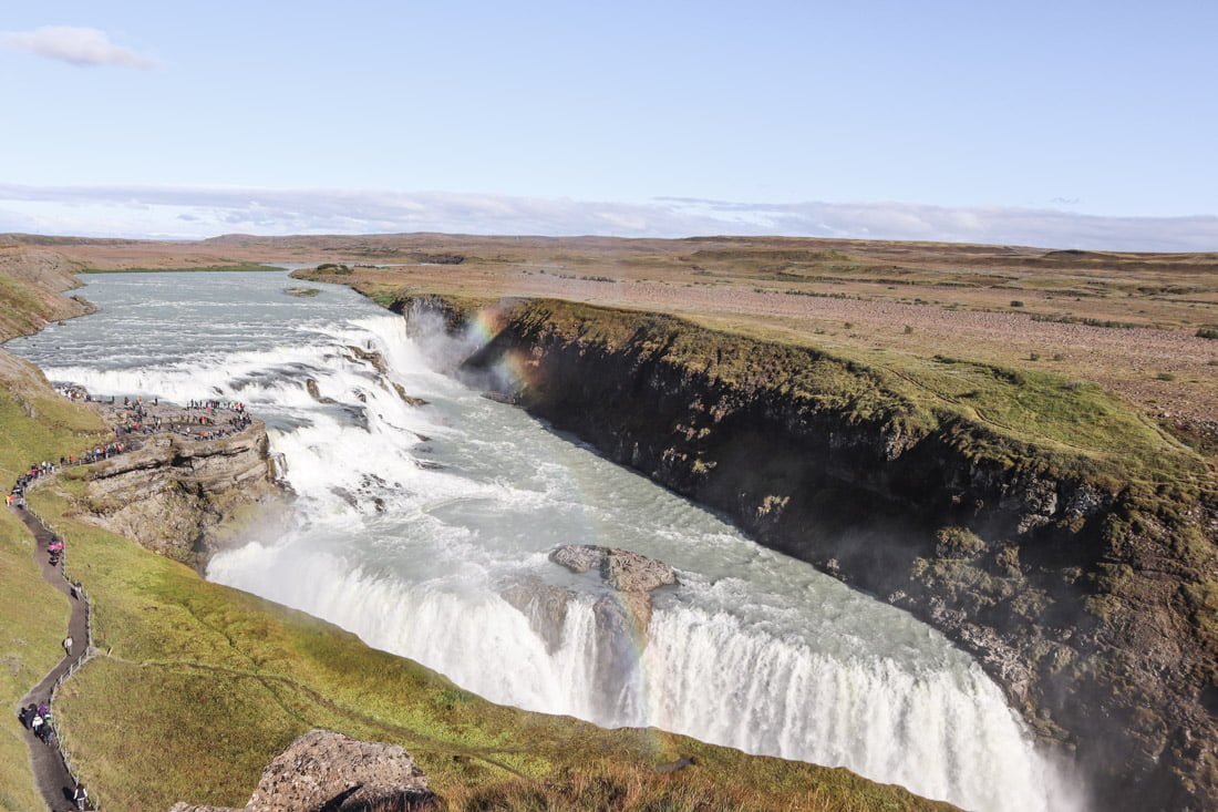 Gullfoss Waterfall flows between landscape in Iceland