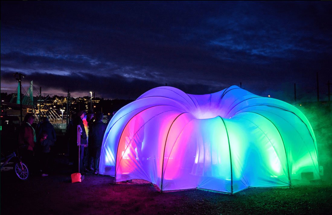 Colorful lights seen through a tent