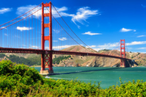 Golden Gate Bridge in San Francisco - red bridge over water on blue sky day
