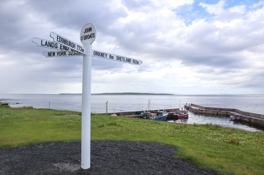 John o Groats signpost bright North Coast 500 Scotland_