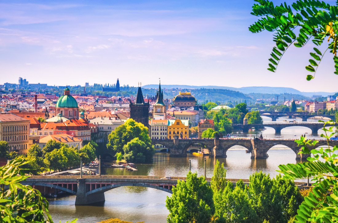 Prague Scenic view on bridges over Vltava river in Prague city. Charles bridge (Karluv Most) and old historical buildings, Czech Republic