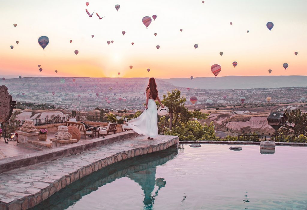 Woman, white dress, swimming pool, hot air balloons, sunrise, Cappadocia Museum Hotel