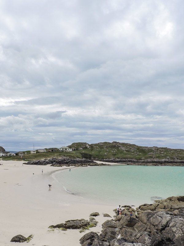 Achmelvich beach, sea, white sand, rocks, people North Coast 500 Scotland