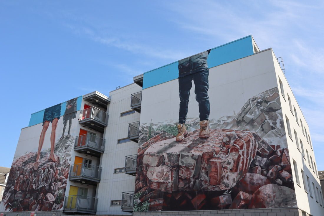 Fintan Magee legs standing on broken walls print Nuart Aberdeen