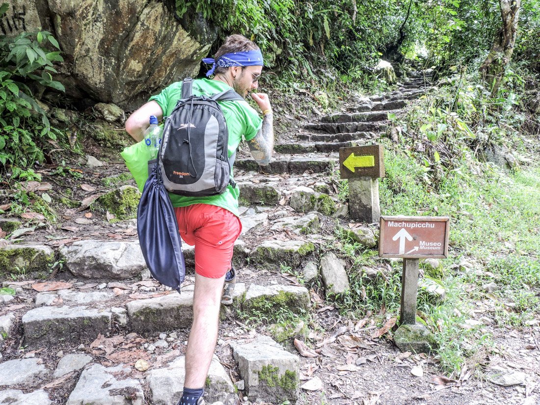Machu Picchu hike, Craig, shorts, tshirt, day bag