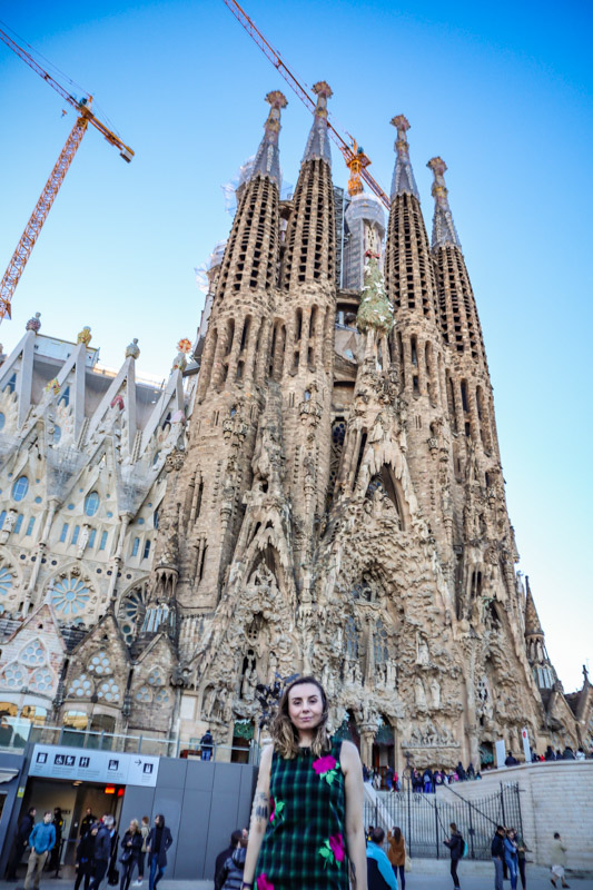 Burry capture on woman in front of La Sagrada Familia