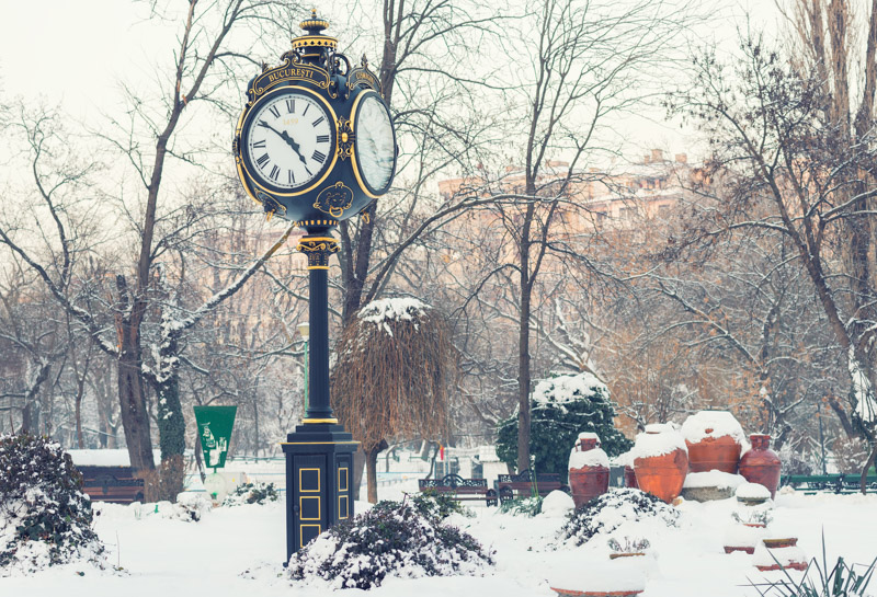 Clock tower in Cismigiu park, Bucharest in winter season