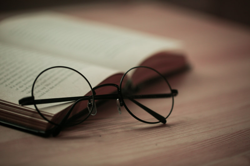 Harry Potter glasses and book