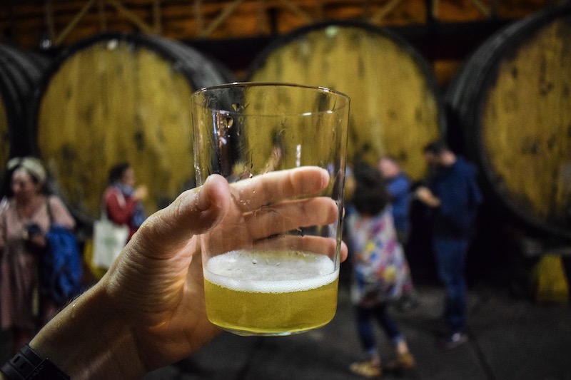 Asturian Cider_Sidra Pouring in Northern Spain - Travel Photography by Ben Holbrook from DriftwoodJournals.com