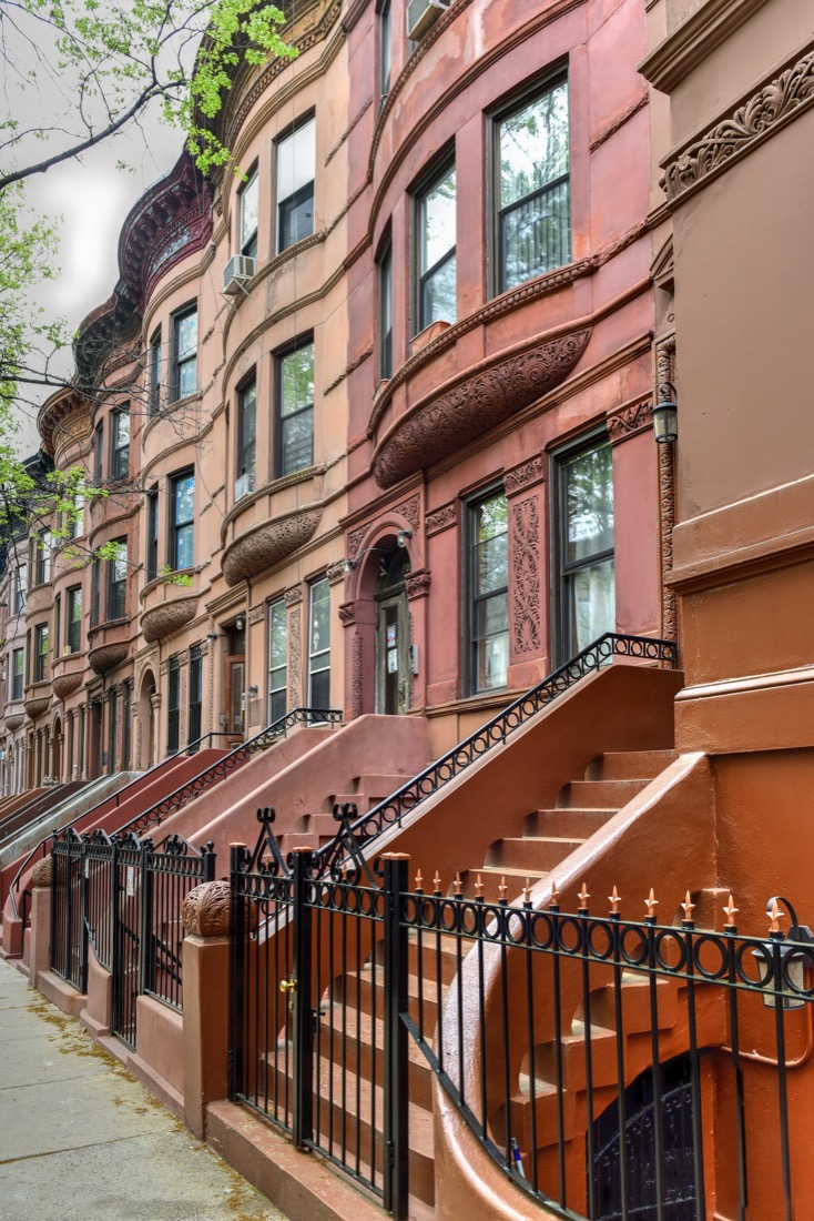 Brownstone houses in Harlem New York City. 