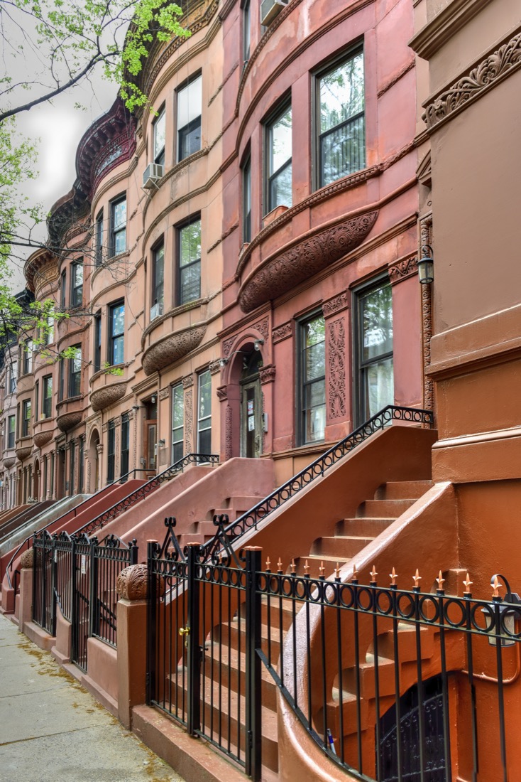 Brownstone houses in Harlem New York City.