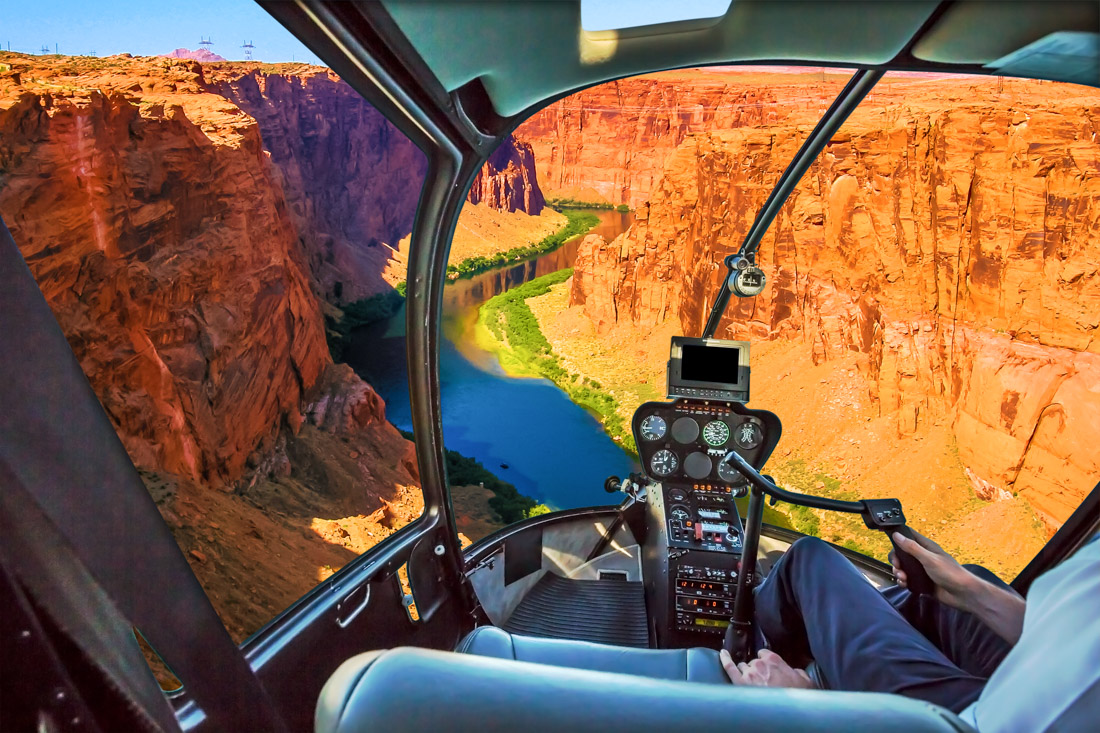 view of the Grand Canyon from a helicopter cockpit