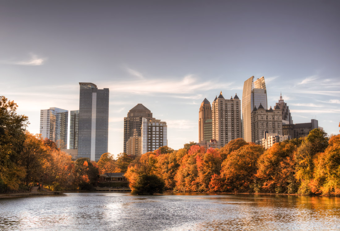 Skyline and reflections of midtown Atlanta, Georgia in Lake Meer from Piedmont Park