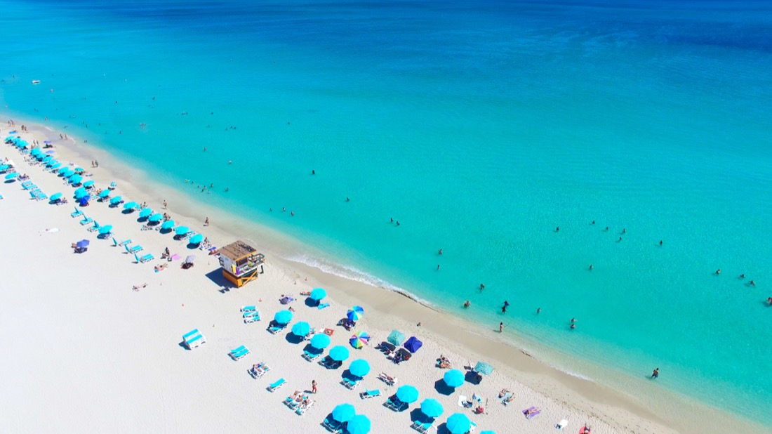 White sand, blue ocean of South Beach, Miami Beach. Florida