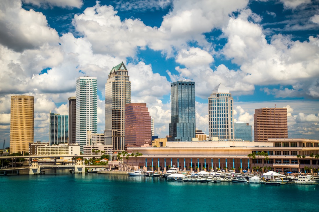 Tampa Florida skyline with sun and clouds