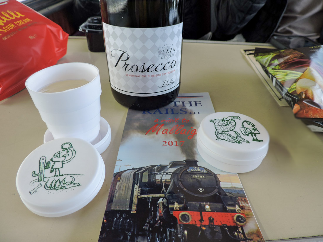 Prosecco and collapsible cups on the Jacobite Steam Train Scotland
