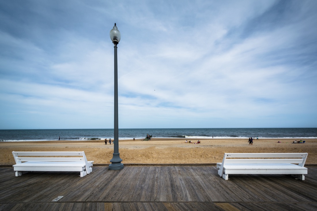 Benches on the boardwalk in Rehoboth Beach, Delaware. Depositphotos_105078830_l-2015