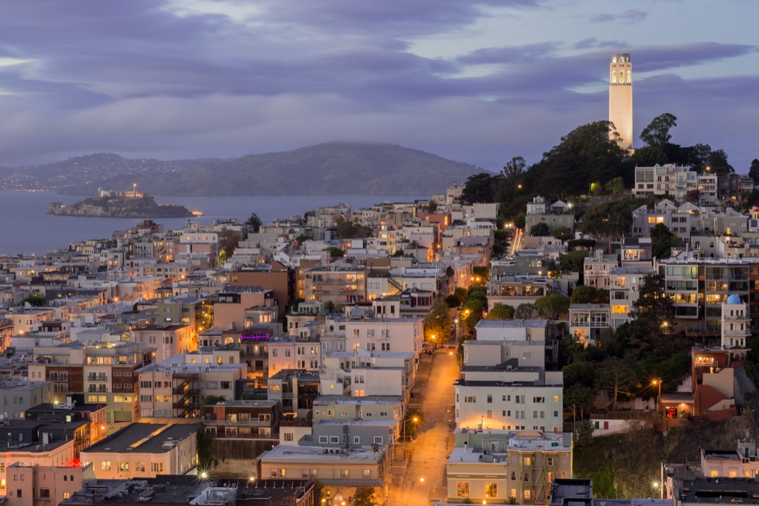 Telegraph Hill and North Beach Neighborhoods at night in San Francisco.