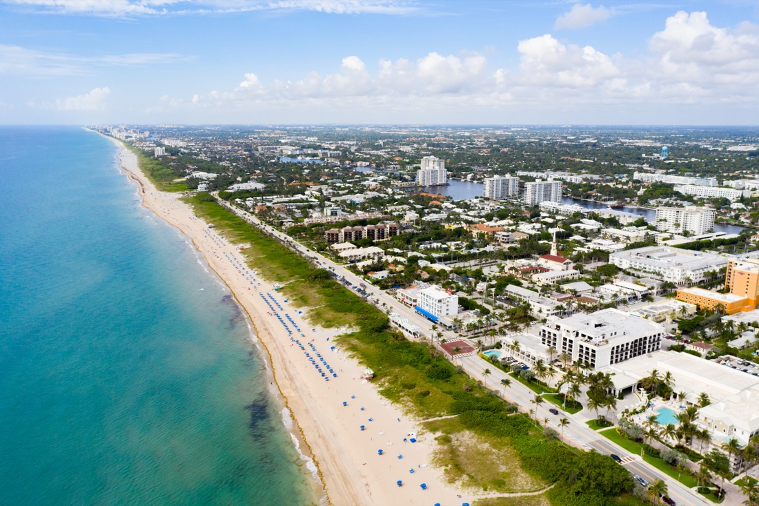 Aerial drone photo of sandy beach and blue ocean at Delray Beach Florida