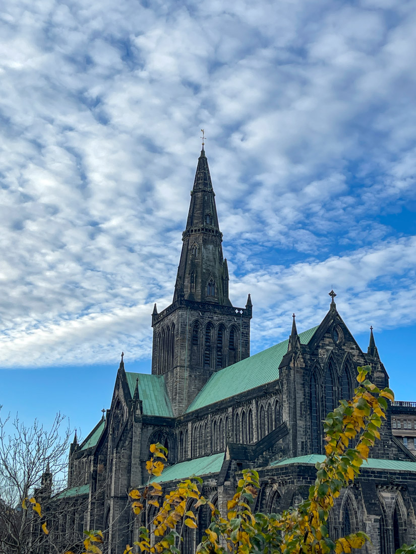 Glasgow Cathedral with blue sky and winter tree