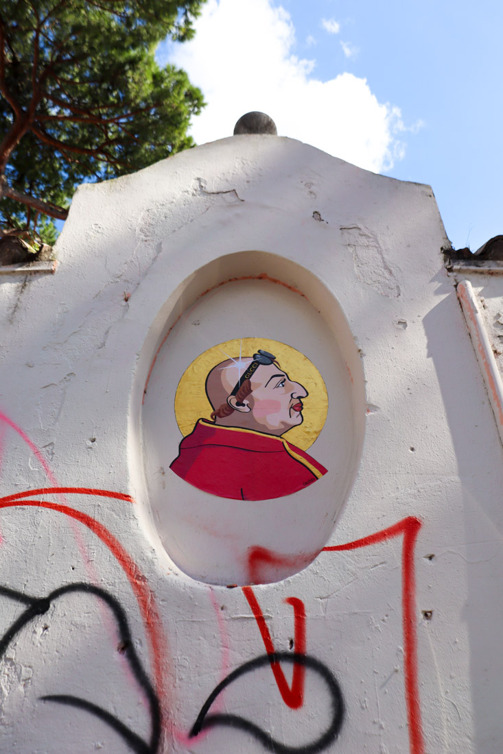 Ostiense street art priest Rome