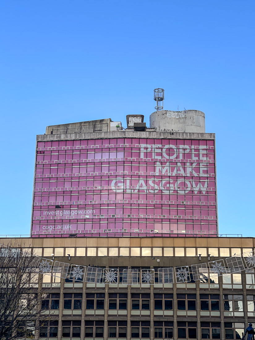People Make Glasgow pink building with blue sky
