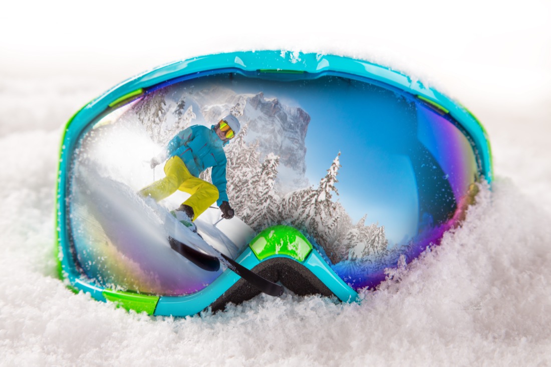 Ski goggles in snow