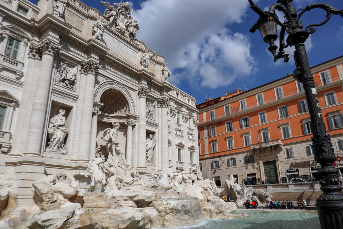 Trevi Fountain Rome with water and blue skies