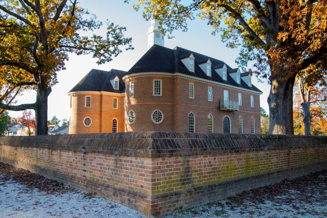 State Capitol building Williamsburg Virginia red stone with trees