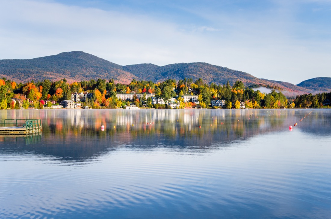 Beautiful Village of Lake Placid with fall colors at Adirondack Mountains