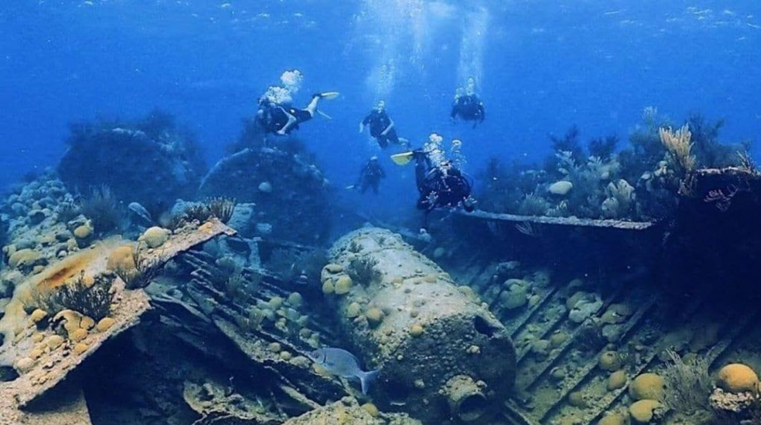 Scuba Diving around Shipwreck in Bermuda