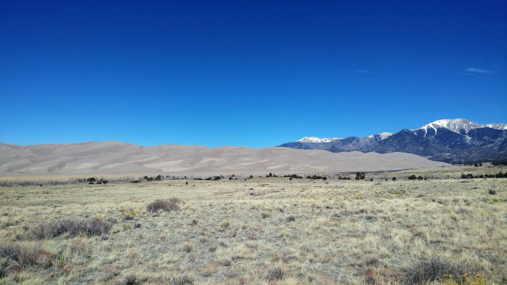 Blue skies and dry land at Great Sand Dunes Colorado