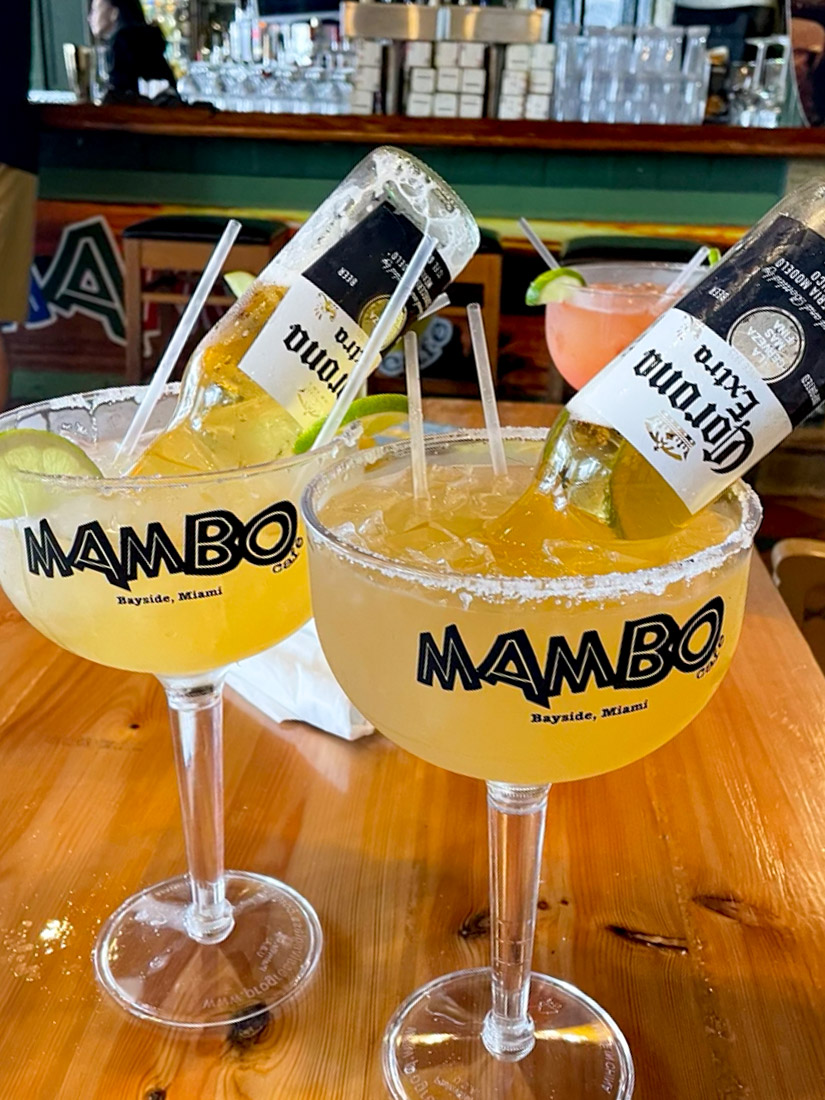 Mambo Bayside Miami cocktails with Corona beer bottles