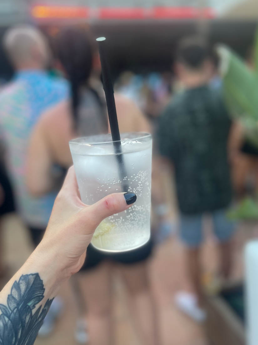 Hand holding vodka lemonade