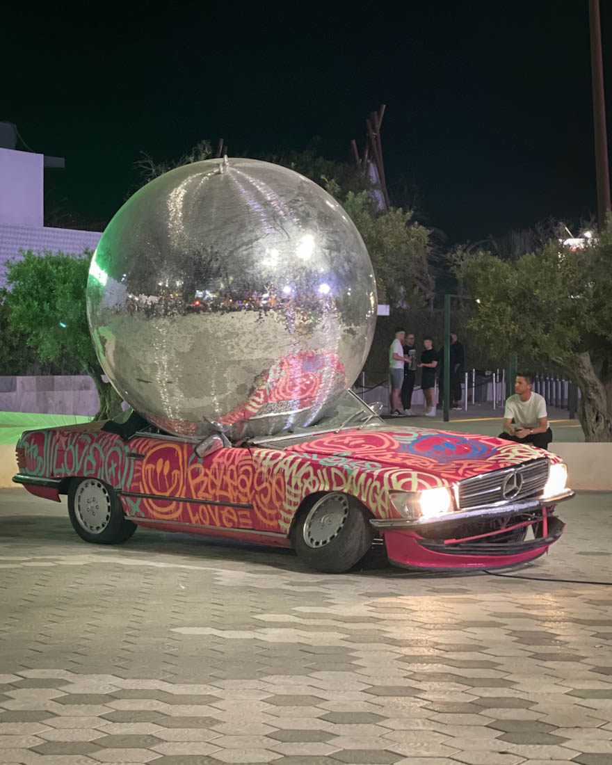 Hi car with a disco ball on it inIbiza