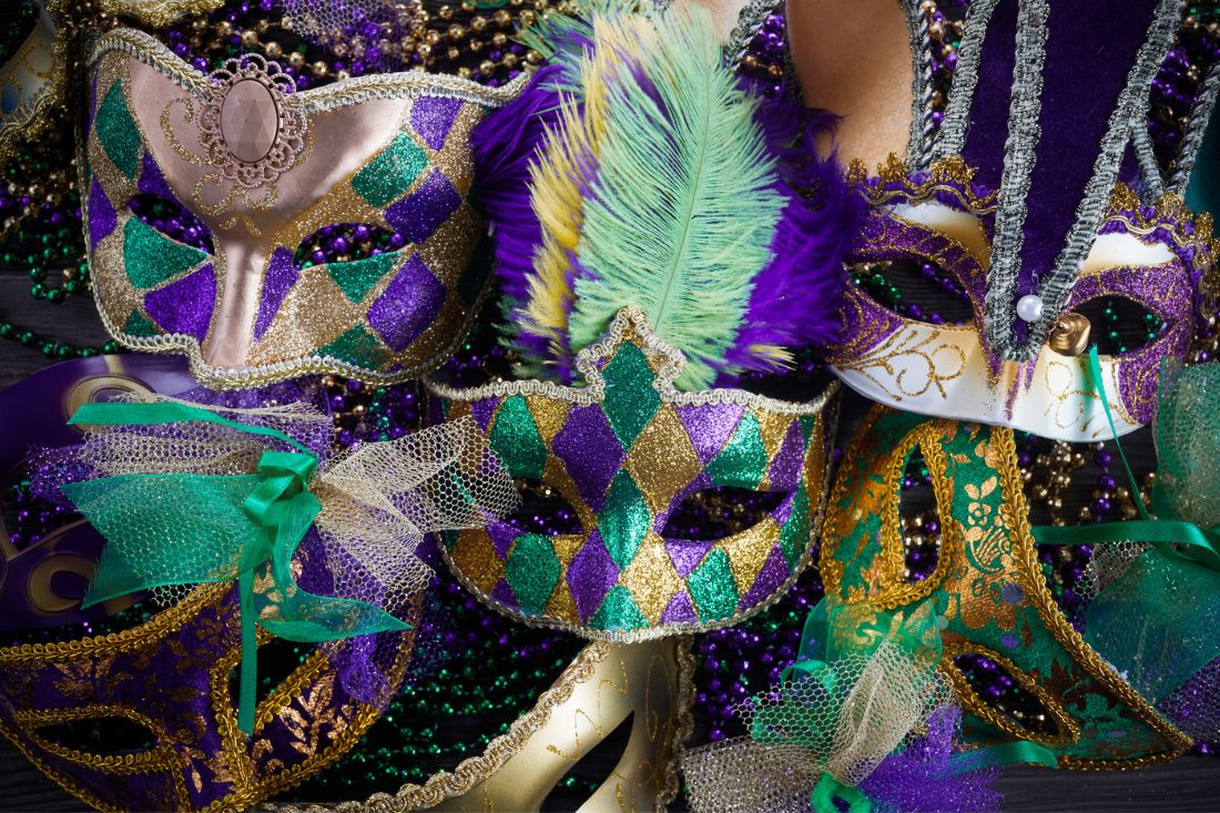 Mardi Gras mask with colorful beads and accessories