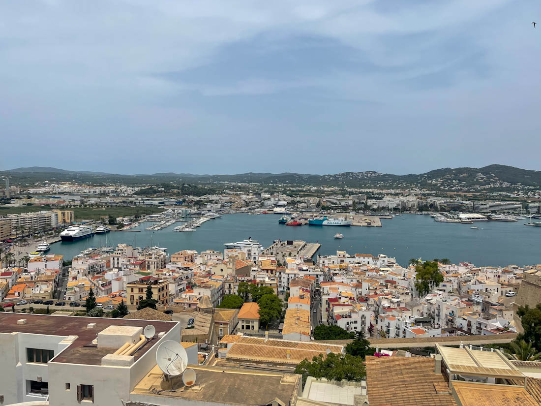 Blue sea and historic buildings of Ibiza Old Town