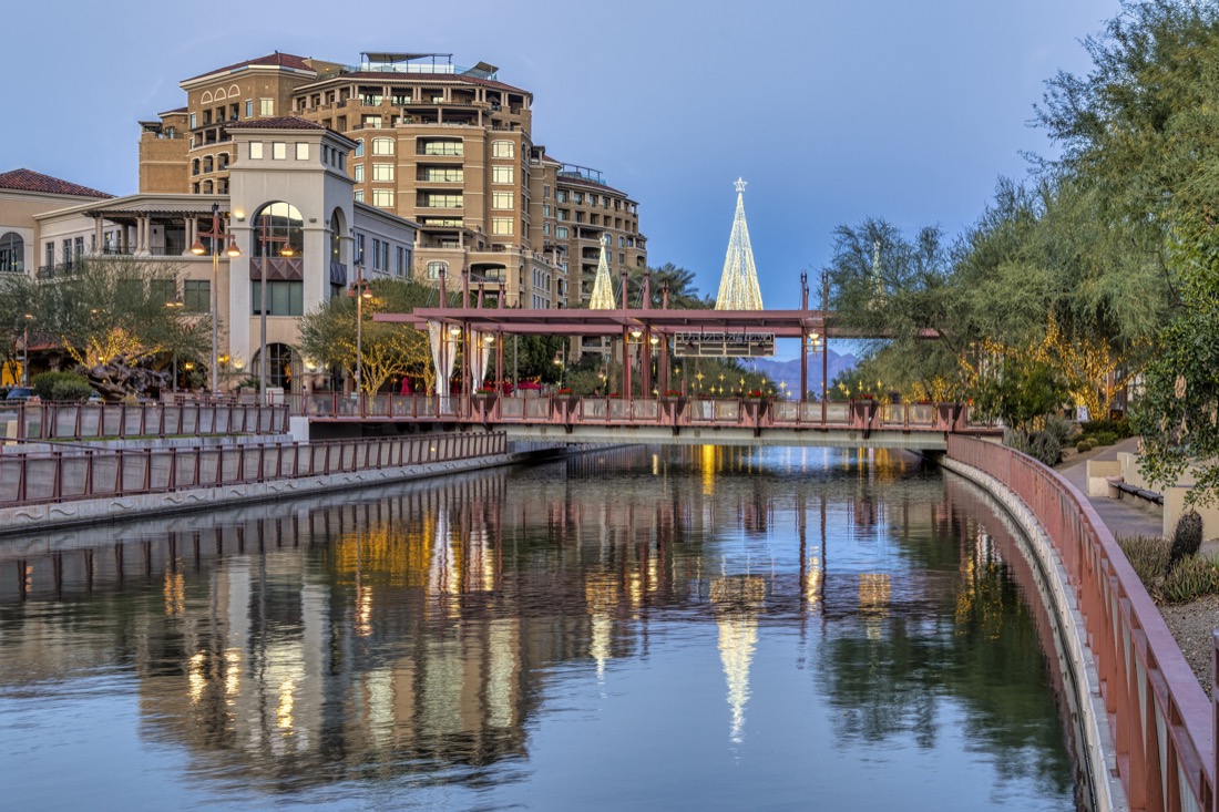 View of Scottsdale, Arizona's waterfront in downtown Scottsdale with Christmas tree in distance